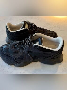 Axel Arigato Black Sneakers with Off-White Lining